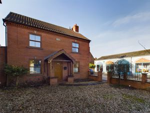 Main elevation- click for photo gallery